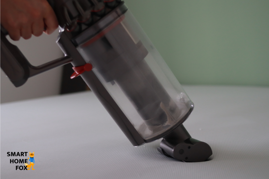 Vacuuming the mattress